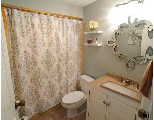 3 Helen Road Braintree, MA 02184 - Photo 14 of 18 a bathroom with a sink and toilet
