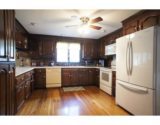 3 Helen Road Braintree, MA 02184 - Photo 2 of 18 a kitchen with a refrigerator a sink dishwasher a stove and a microwave