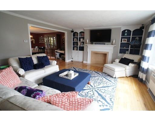 3 Helen Road Braintree, MA 02184 - Photo 6 of 18 a living room with furniture a rug and a flat screen tv