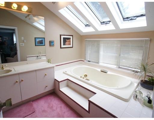 3 Helen Road Braintree, MA 02184 - Photo 10 of 18 a bathroom with a tub sink and mirror