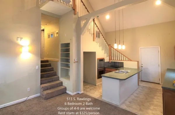 a view of entryway with stairs and furniture