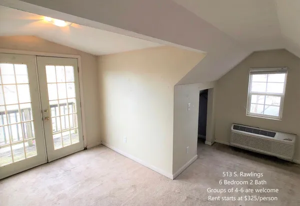 an empty room with windows