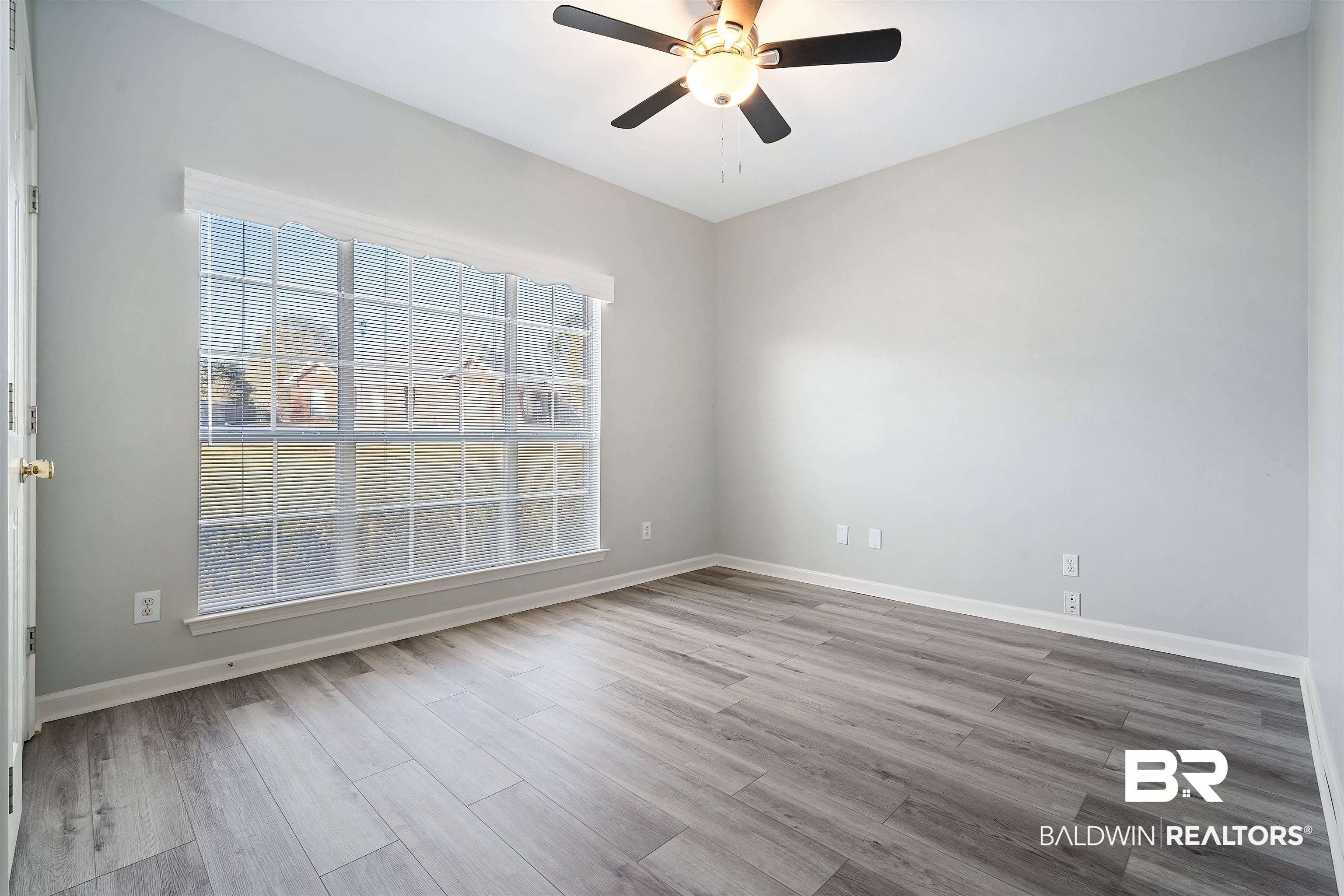 615 Summerlake Place Mobile, AL 36608 - Photo 22 of 35 Spare room with light wood-type flooring and ceiling fan