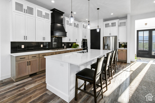 1952 Highway 118 Monroe, UT 84754 - Photo 23 of 88 Kitchen with custom range hood, dark wood-style floors, a large island with sink, light countertops, and recessed lighting