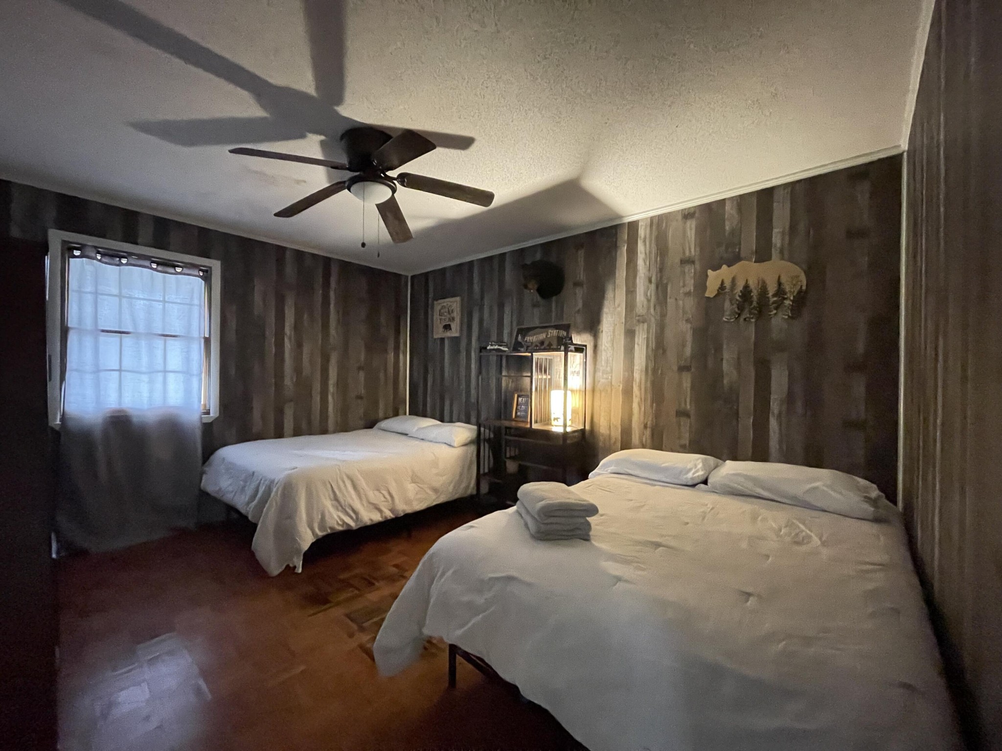 1522 Turkey Creek Road Tellico Plains, TN 37385 - Photo 20 of 34 a bedroom with two beds and painted walls