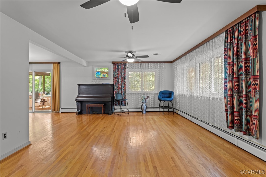 4976 Windsor Road Sandston, VA 23150 - Photo 9 of 41 Living room featuring a ceiling fan, a baseboard h
