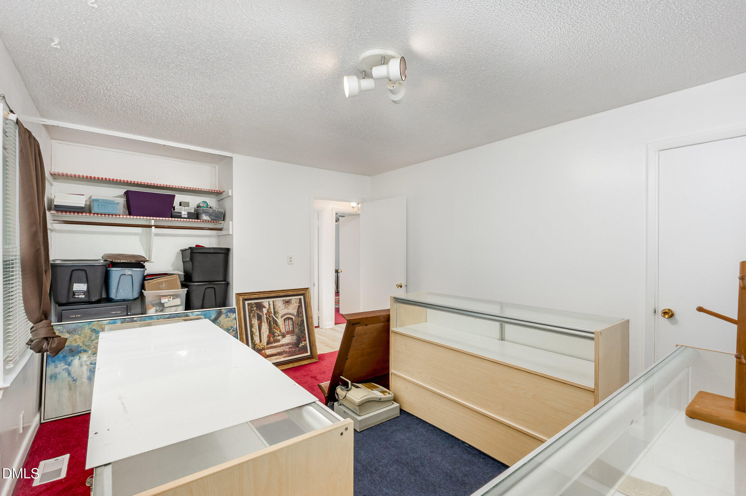 3228 Julian Drive Raleigh, NC 27604 - Photo 19 of 29 a view of a room with gym equipment