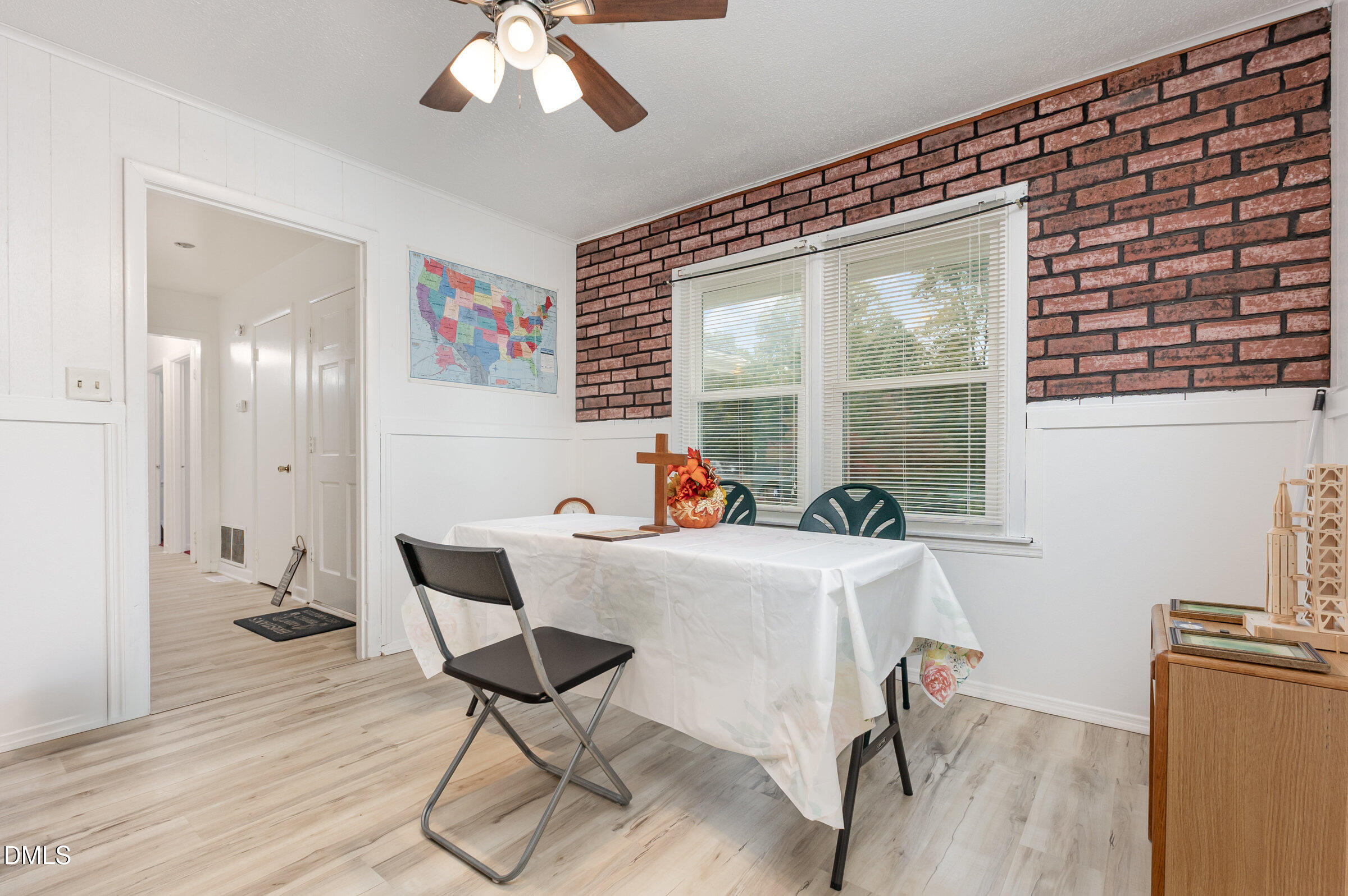 3228 Julian Drive Raleigh, NC 27604 - Photo 9 of 29 a living room with furniture and a large window