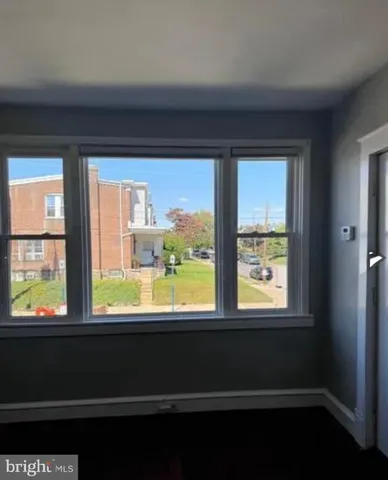 a view of a large window with an outdoor space