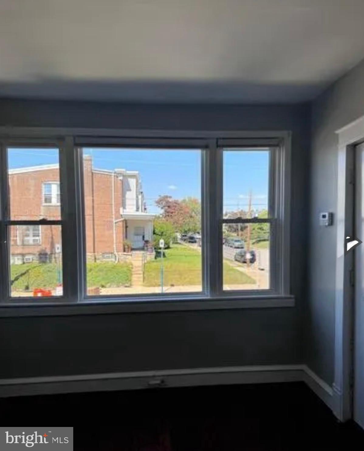 7725 Walker Street Philadelphia, PA 19136 - Photo 3 of 8 a view of a large window with an outdoor space