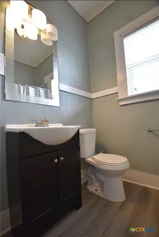 a bathroom with a sink and a toilet