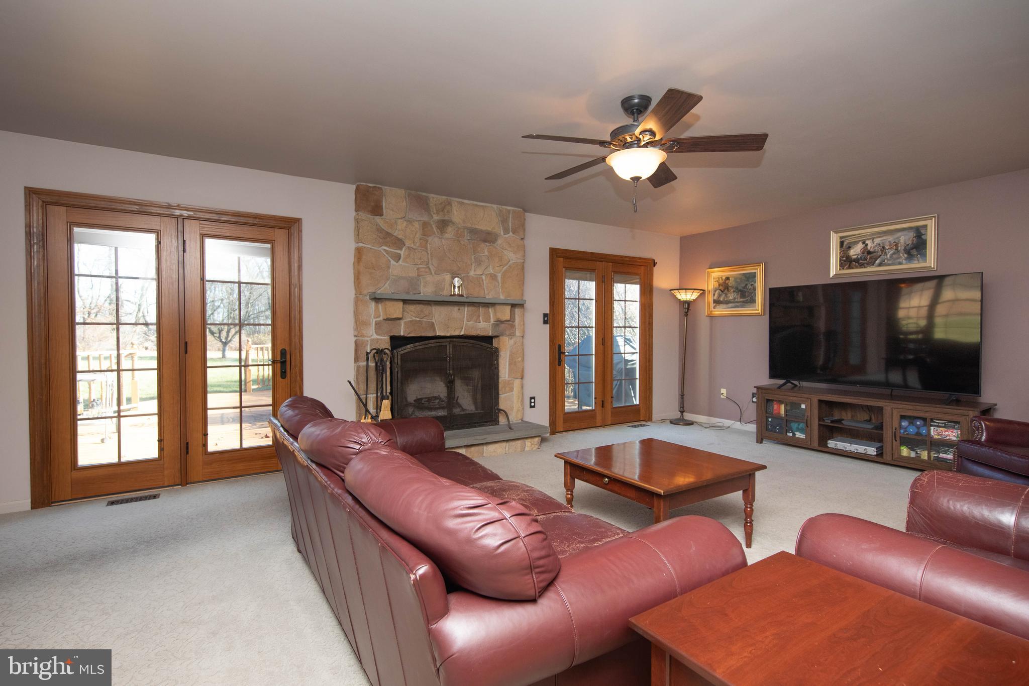 161 Ridgeview Drive Pottstown, PA 19465 - Photo 15 of 62 Great room with rear yard views and access