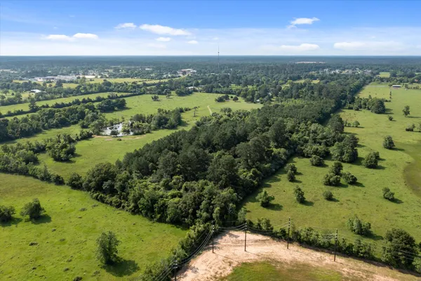 a view of a city with mountains in the background