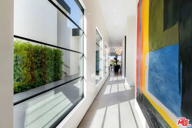 a view of a chairs and tables in a room