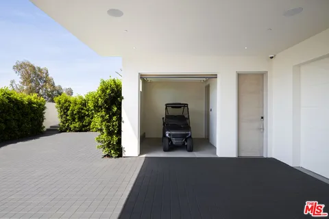 a swimming pool with outdoor seating