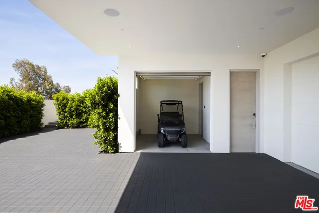 a swimming pool with outdoor seating