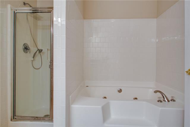 306 Eastside Road Burns, TN 37029 - Photo 13 of 19 ..New ceramic tile around the whirlpool and shower and a walk in closet