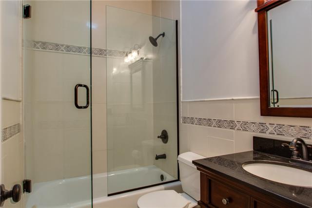 306 Eastside Road Burns, TN 37029 - Photo 14 of 19 The second bath has also had a full renovation!
