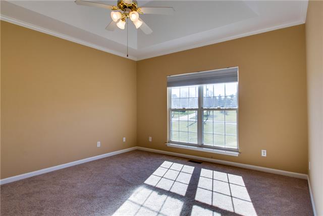 306 Eastside Road Burns, TN 37029 - Photo 10 of 19 The owner's suite provides lots of privacy with a split bedroom layout.
