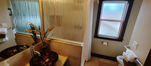 a view of a pathway with a backyard