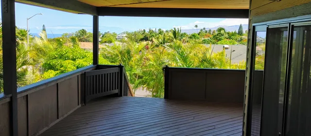 a bathroom with a sink vanity and a mirror