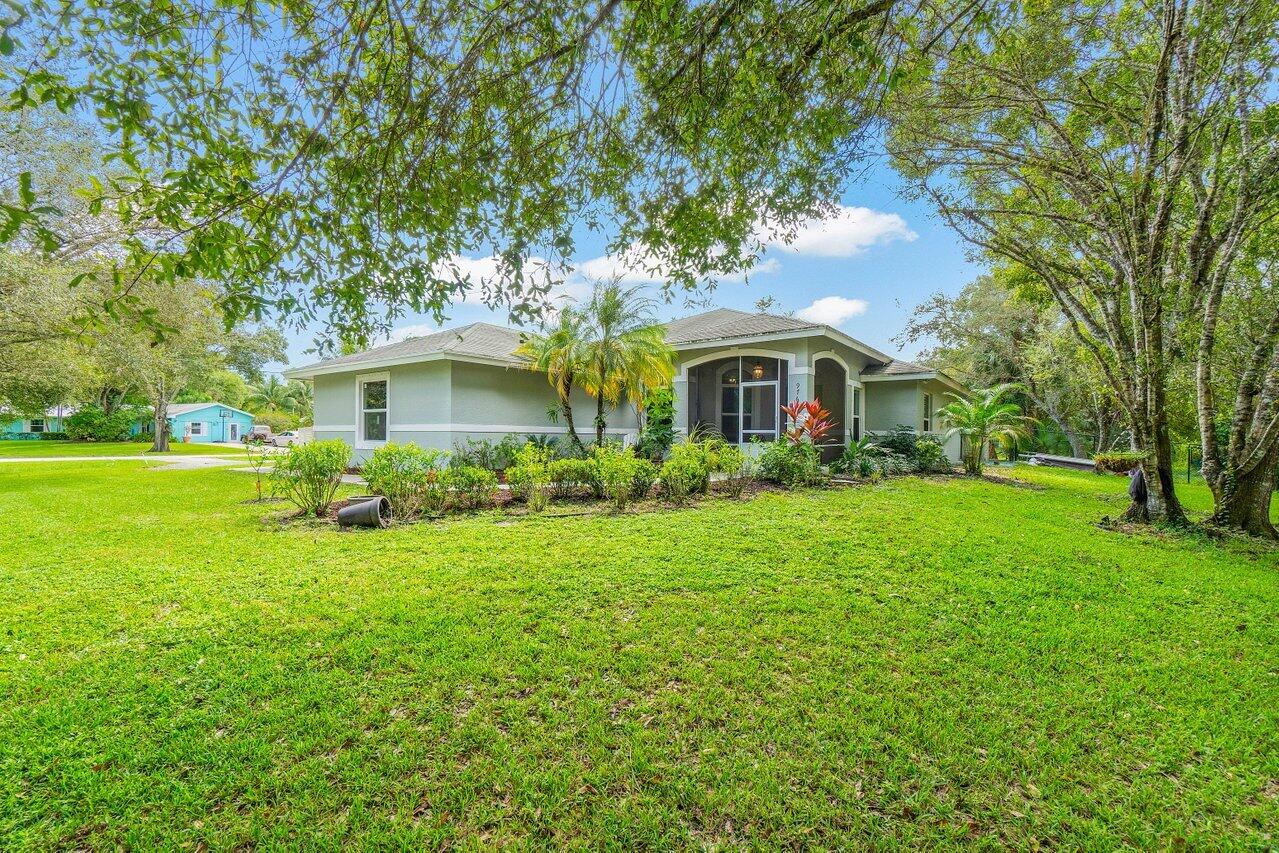 9764 154th Road North Jupiter, FL 33478 - Photo 1 of 37 003-9764154thRoadNorth-Jupiter-FL-33478-