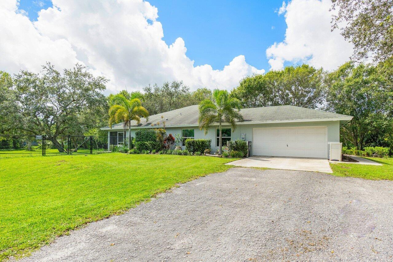 9764 154th Road North Jupiter, FL 33478 - Photo 3 of 37 001-9764154thRoadNorth-Jupiter-FL-33478-