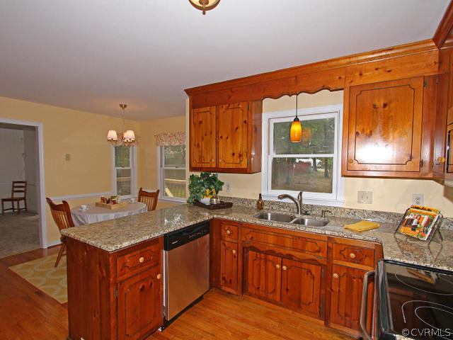 5513 Gatebridge Road North Chesterfield, VA 23234 - Photo 11 of 24 a bathroom with a granite countertop sink and a mirror