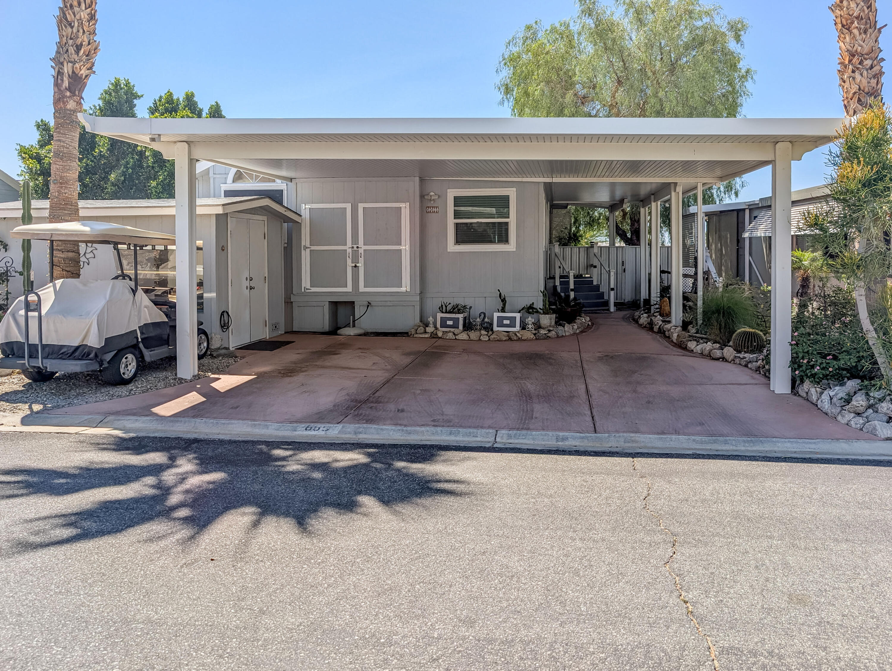 70200 Dillon Road, Unit 665 Desert Hot Springs, CA 92241 - Photo 2 of 40 a view of a outdoor space of the house
