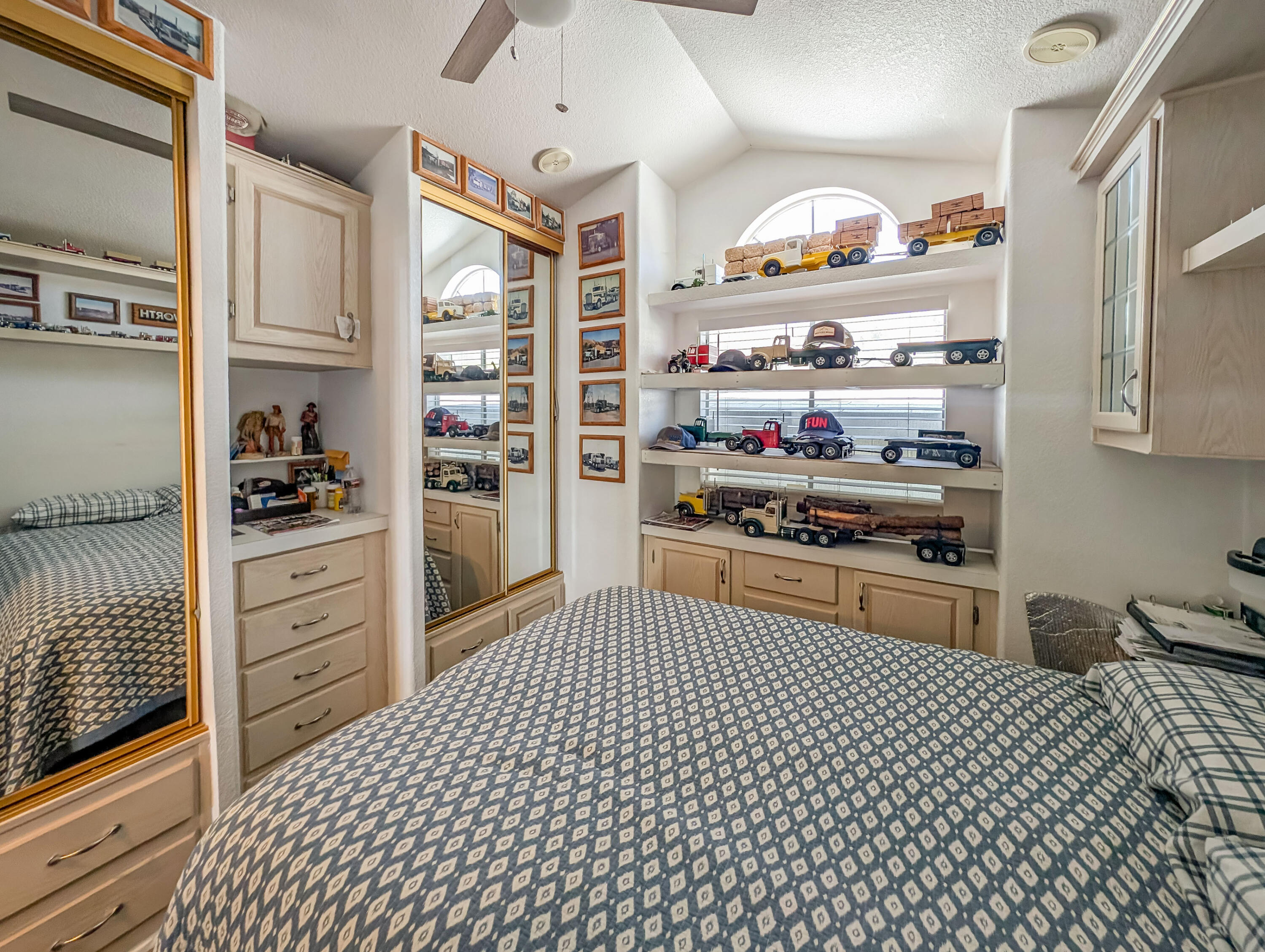 70200 Dillon Road, Unit 665 Desert Hot Springs, CA 92241 - Photo 21 of 40 a kitchen with stainless steel appliances a refrigerator and cabinets