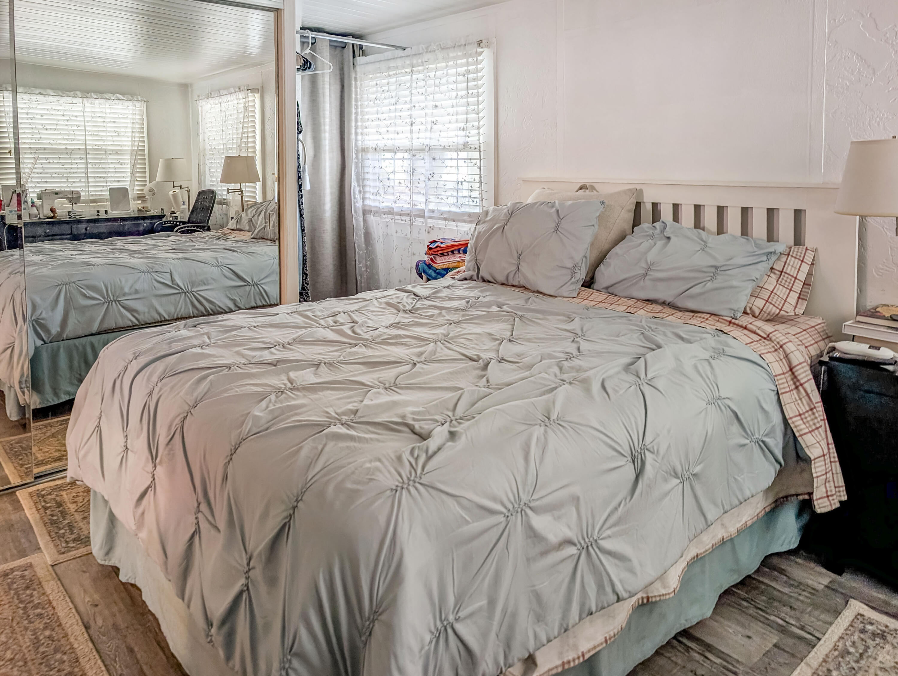 70200 Dillon Road, Unit 665 Desert Hot Springs, CA 92241 - Photo 27 of 40 a bedroom with a bed and window