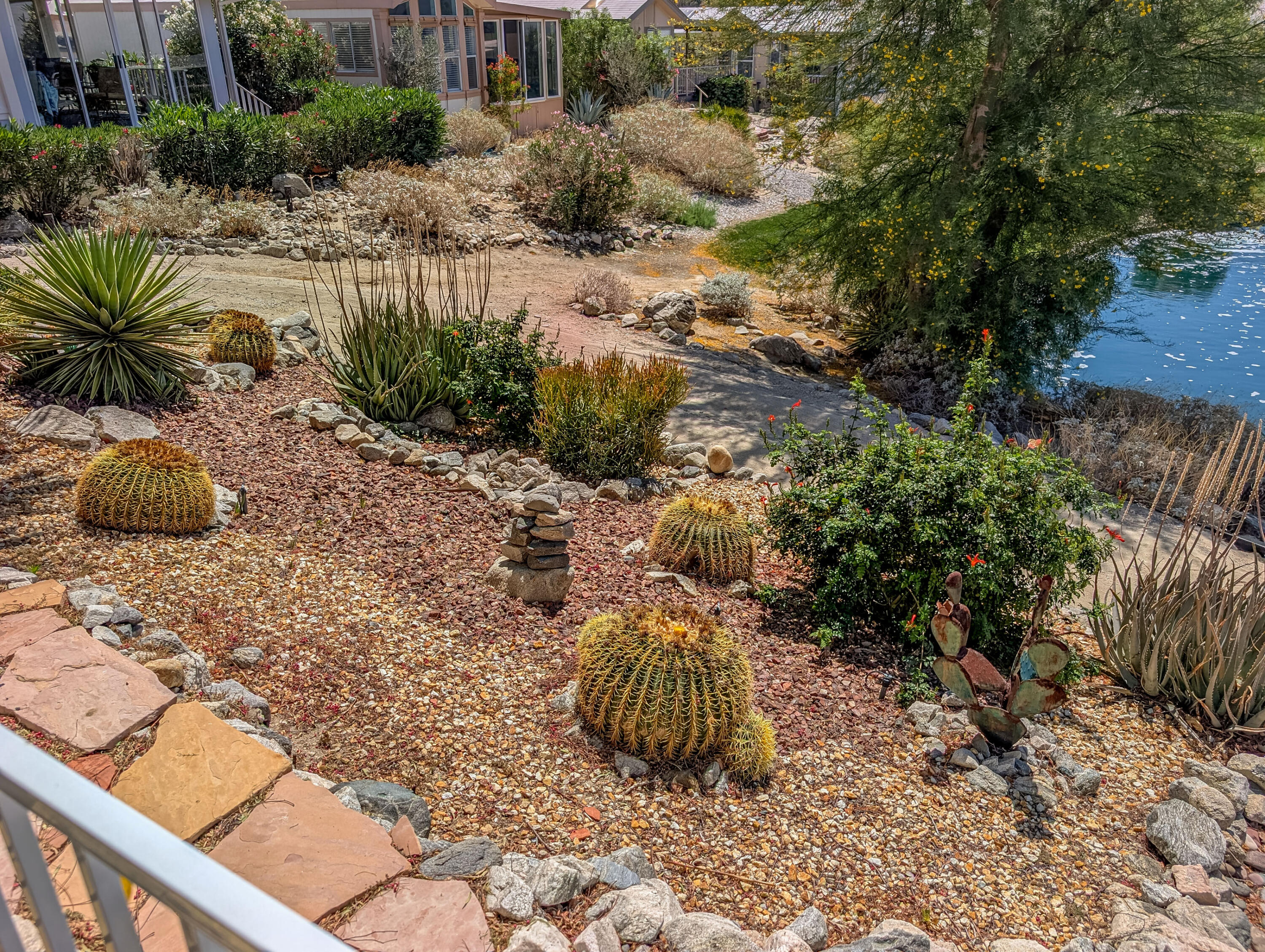 70200 Dillon Road, Unit 665 Desert Hot Springs, CA 92241 - Photo 35 of 40 a view of a backyard of a house