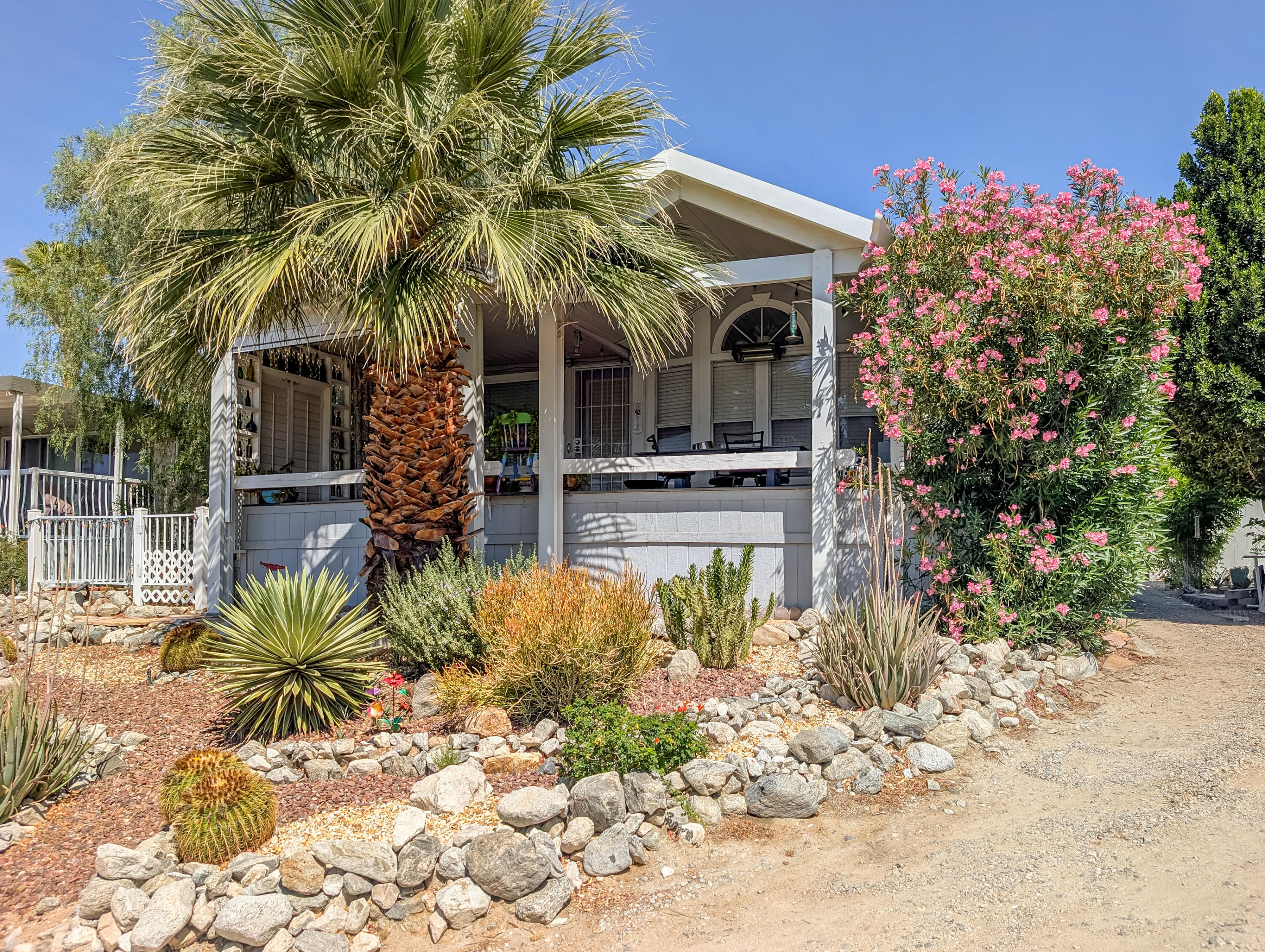 70200 Dillon Road, Unit 665 Desert Hot Springs, CA 92241 - Photo 5 of 40 a view of a house with a patio