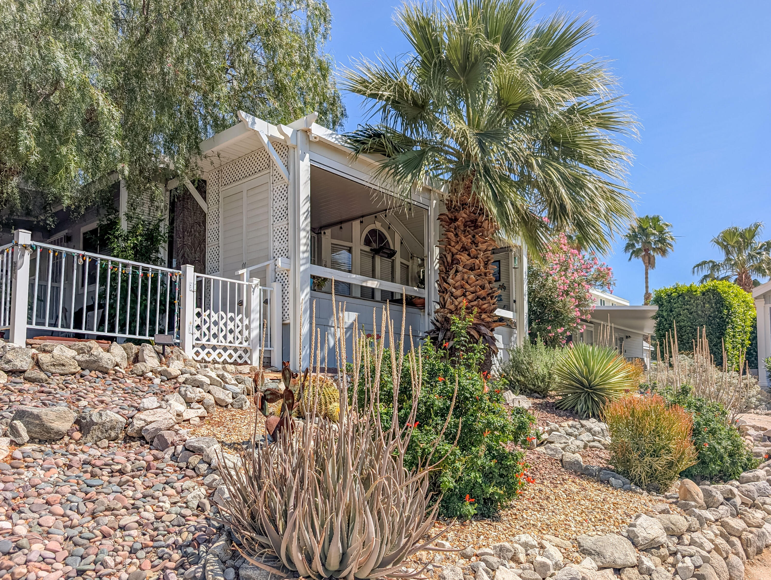 70200 Dillon Road, Unit 665 Desert Hot Springs, CA 92241 - Photo 6 of 40 a view of a house with a yard