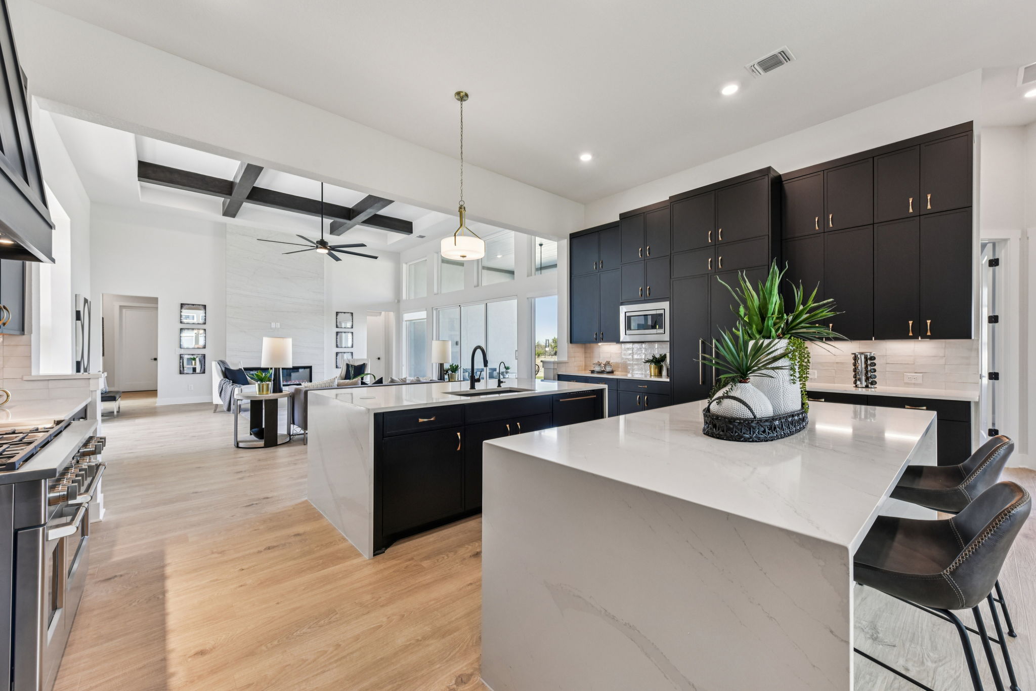 208 Winters Cove Georgetown, TX 78633 - Photo 11 of 37 a kitchen with a refrigerator and a sink