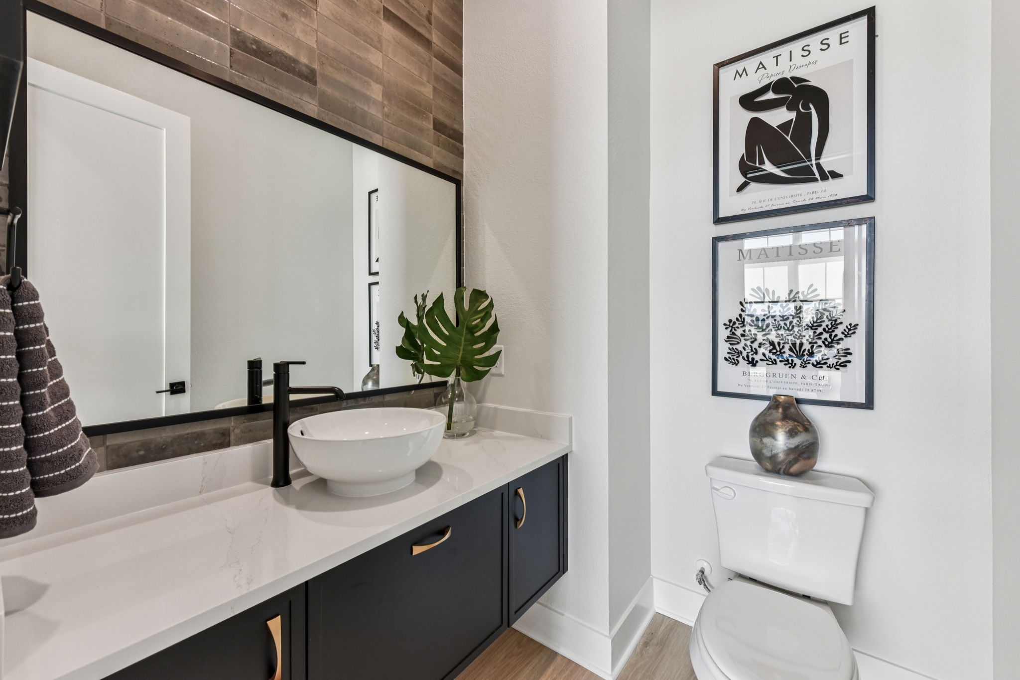 208 Winters Cove Georgetown, TX 78633 - Photo 15 of 37 a bathroom with a sink a mirror and vanity