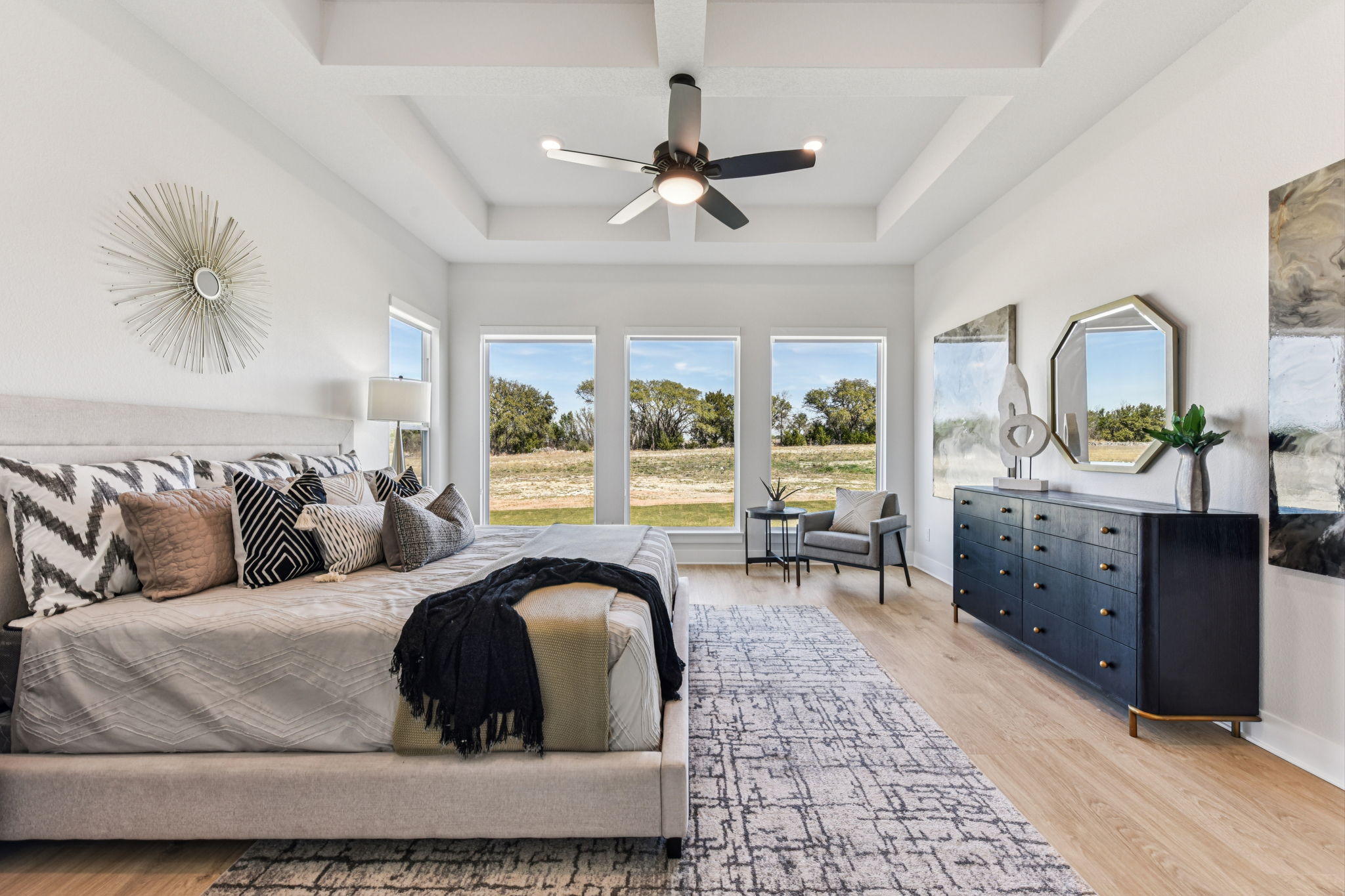 208 Winters Cove Georgetown, TX 78633 - Photo 21 of 37 a living room with a couch and a potted plant