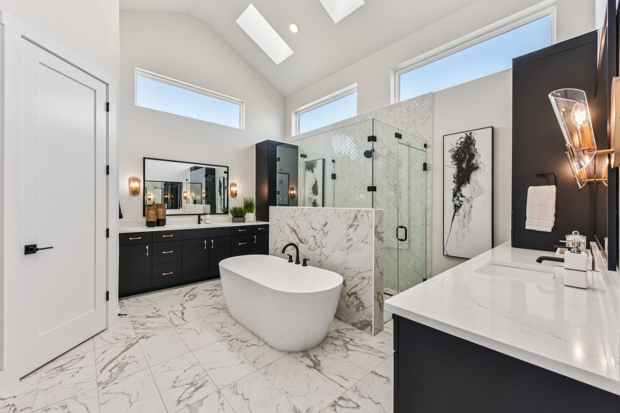 208 Winters Cove Georgetown, TX 78633 - Photo 23 of 37 a spacious bathroom with a double vanity sink mirror and bathtub