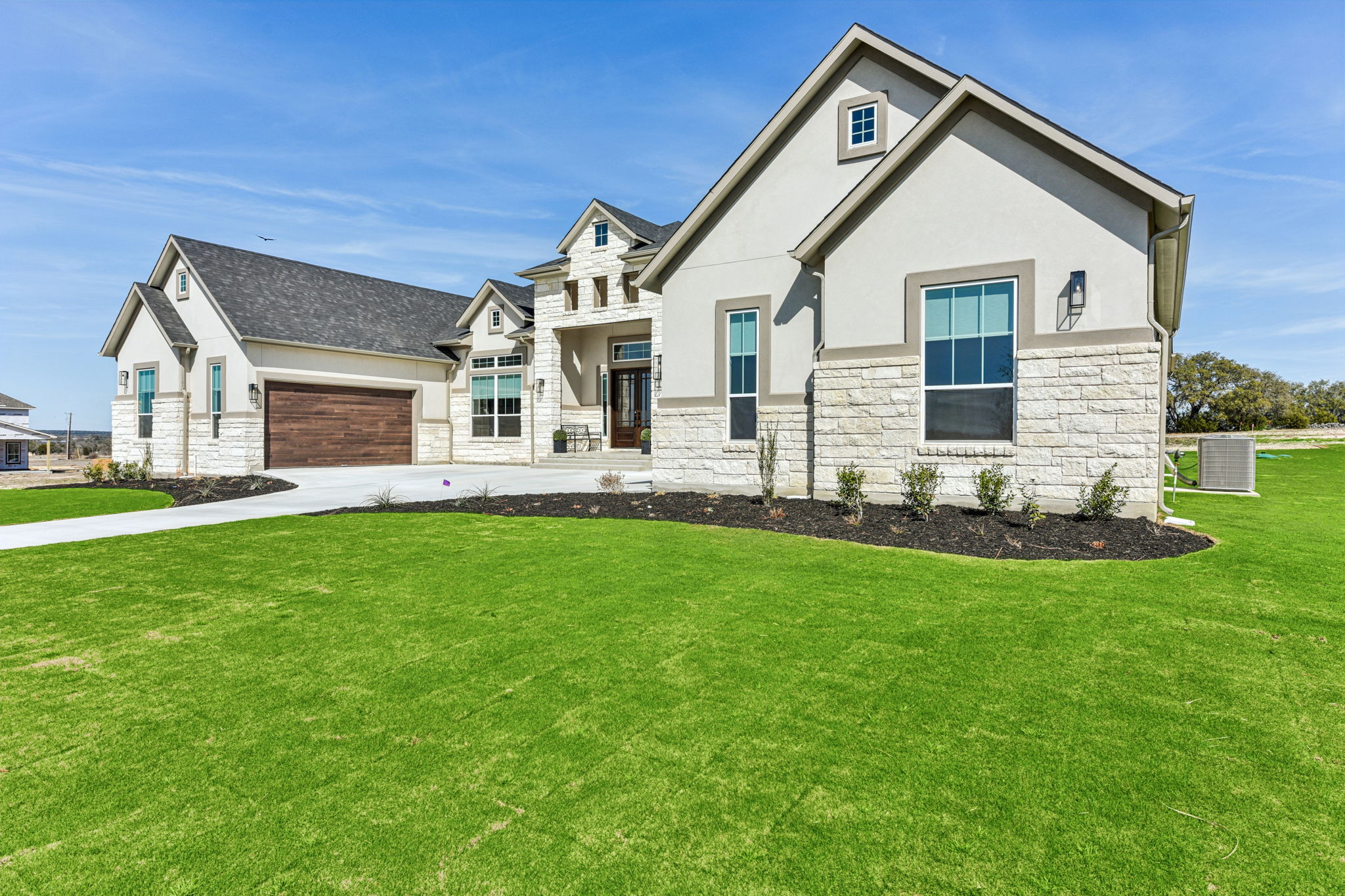 208 Winters Cove Georgetown, TX 78633 - Photo 3 of 37 a front view of house with yard and green space