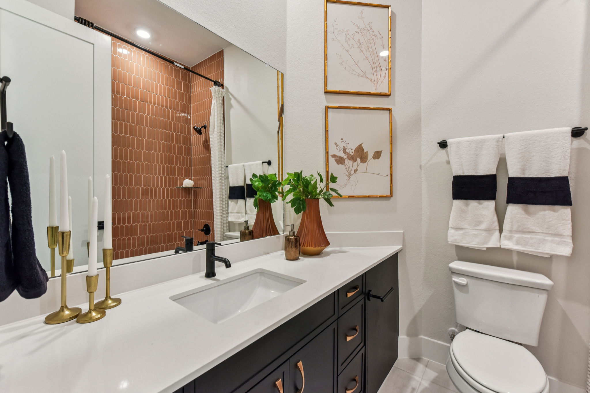 208 Winters Cove Georgetown, TX 78633 - Photo 33 of 37 a bathroom with a sink a toilet and mirror