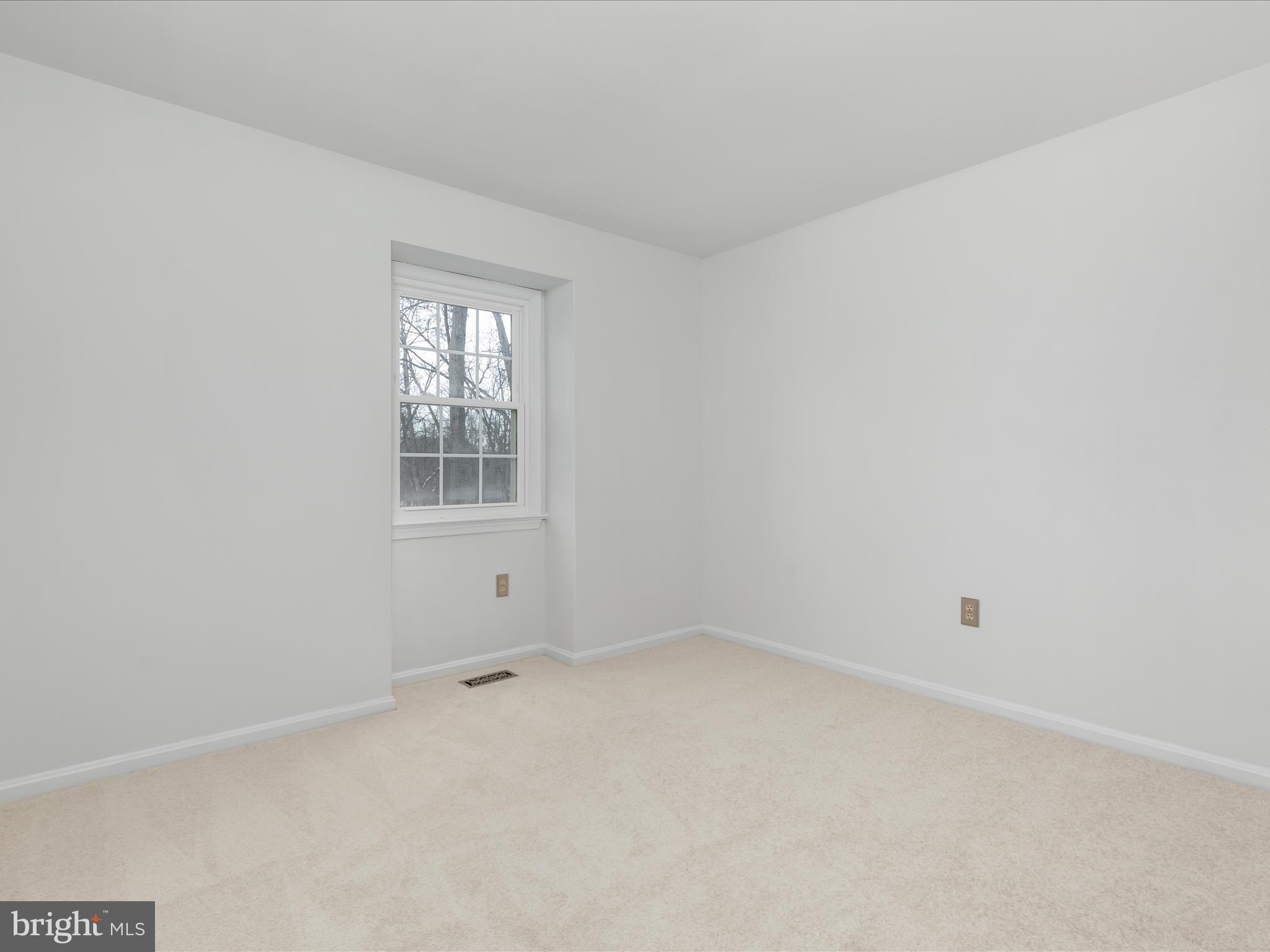 10821 Cross School Road Reston, VA 20191 - Photo 25 of 50 an empty room with a window