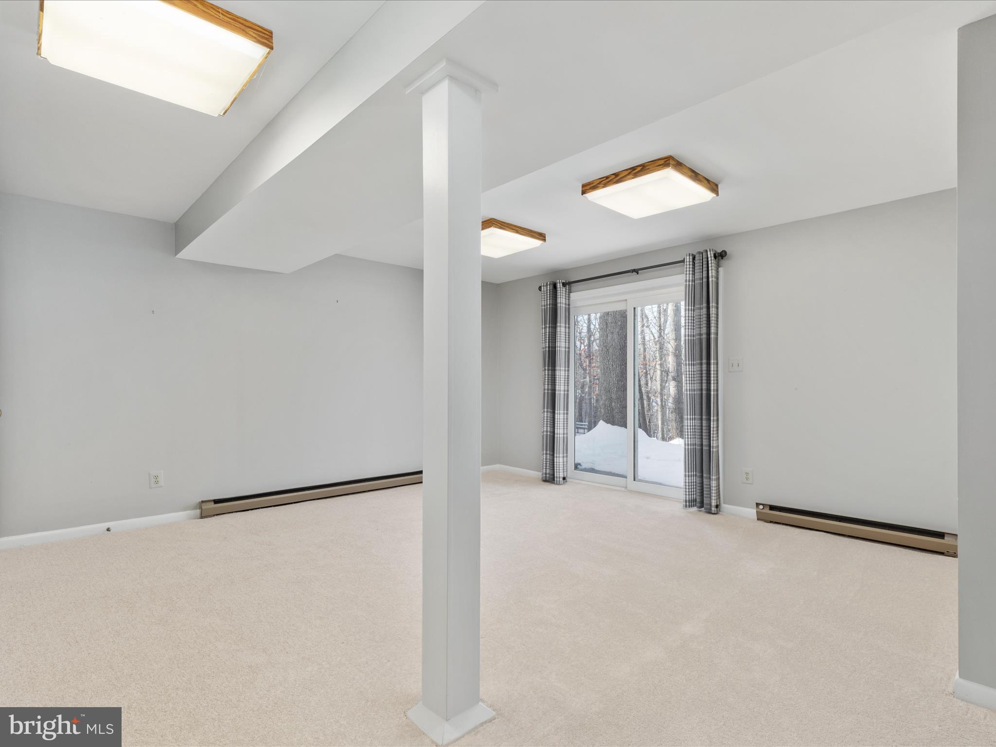 10821 Cross School Road Reston, VA 20191 - Photo 30 of 50 a view of an empty room with a window