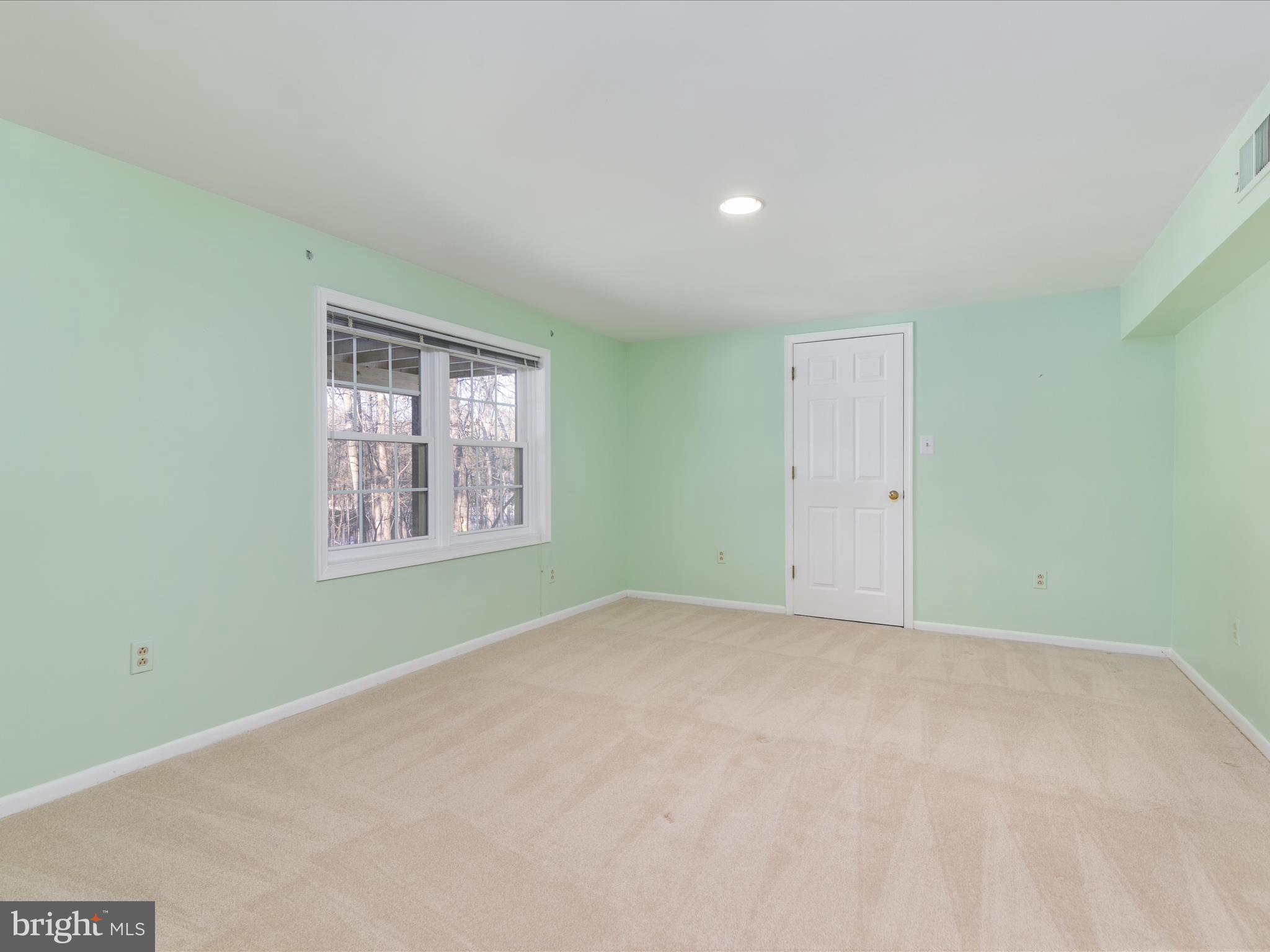 10821 Cross School Road Reston, VA 20191 - Photo 34 of 50 an empty room with windows