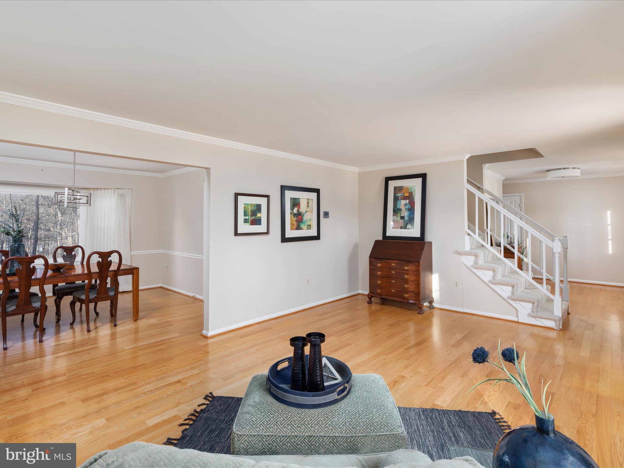 10821 Cross School Road Reston, VA 20191 - Photo 8 of 50 a living room with furniture and a wooden floor