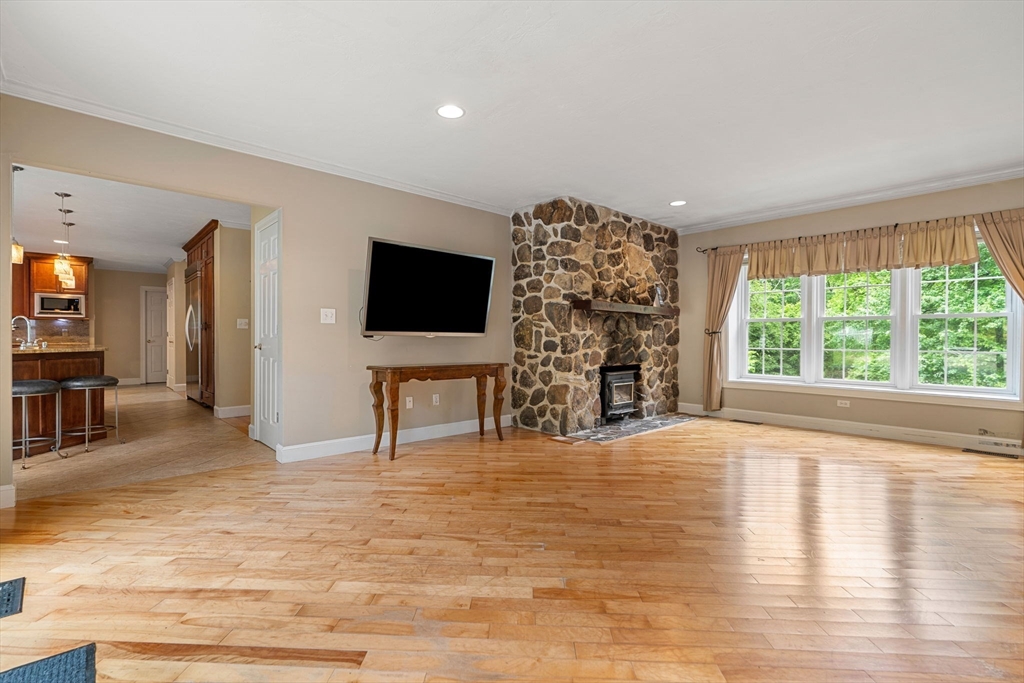 122 Depot Road Boxford, MA 01921 - Photo 12 of 41 a living room with furniture and a flat screen tv