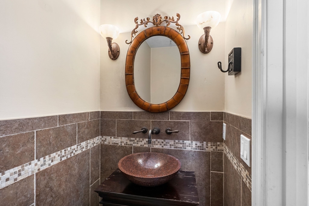 122 Depot Road Boxford, MA 01921 - Photo 14 of 41 a bathroom with a sink and a mirror