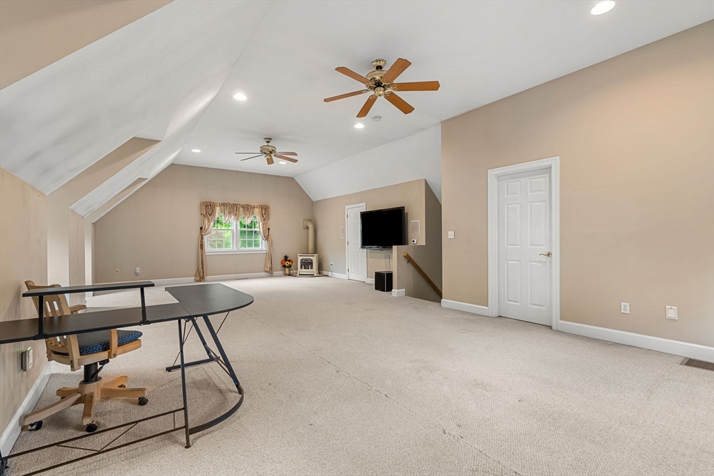 122 Depot Road Boxford, MA 01921 - Photo 19 of 41 a view of a livingroom with furniture and windows