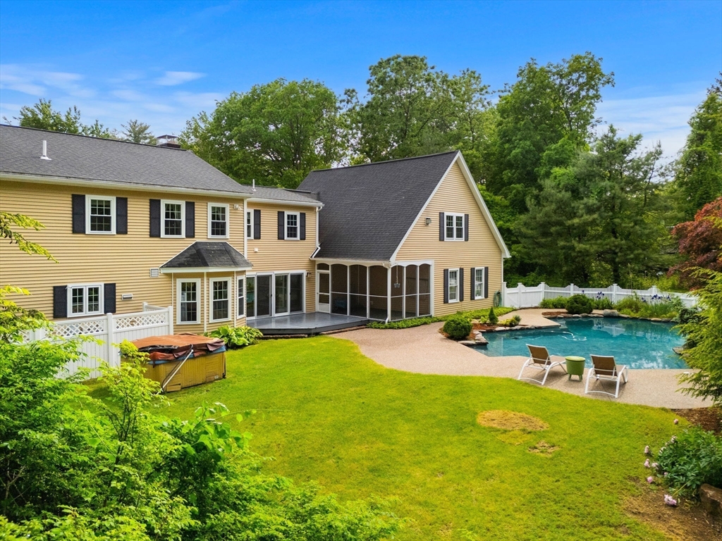 122 Depot Road Boxford, MA 01921 - Photo 33 of 41 a front view of a house with garden and trees