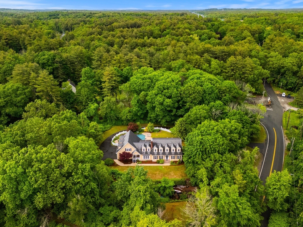 122 Depot Road Boxford, MA 01921 - Photo 37 of 41 a sign of golf club on a wall under a tree