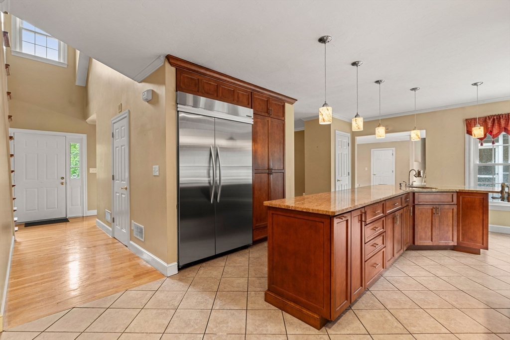 122 Depot Road Boxford, MA 01921 - Photo 9 of 41 a kitchen with stainless steel appliances granite countertop a refrigerator and a sink